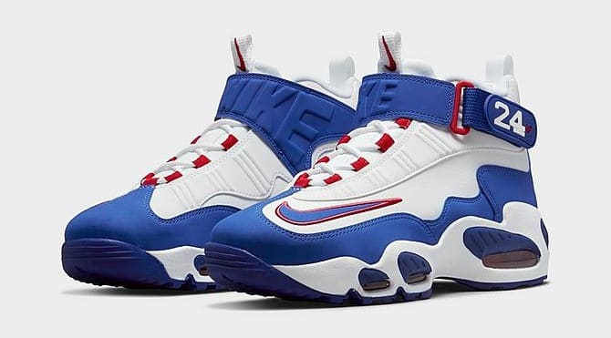Side view of Ken Griffey's white and blue Nike shoes.